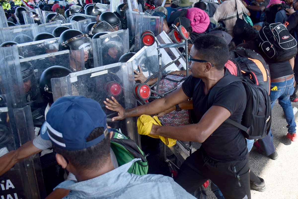 Mexico Migrant Caravan Pushes Past Police as Group Heads North