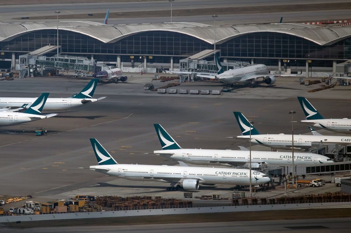 Hong Kong Arrests Ex-Cathay Crew at Center of Omicron Outbreak