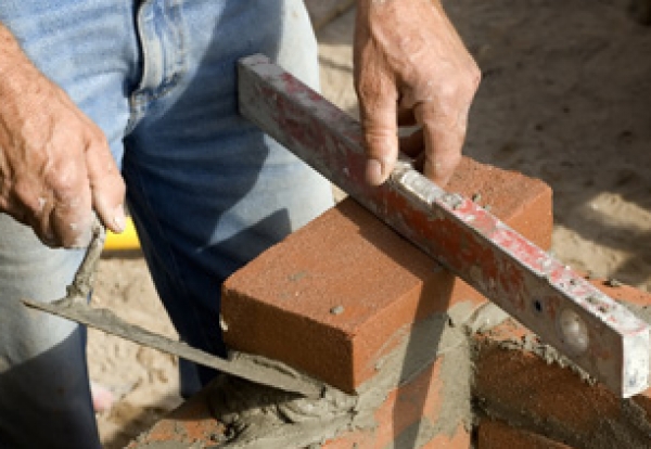 House builders put brake on wage hikes as labour shortages ease