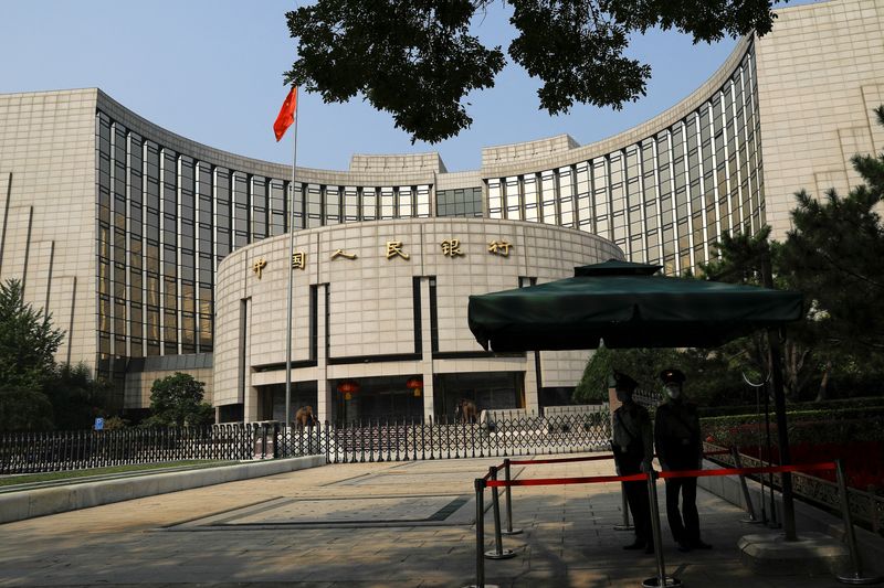 China holds lending rates steady; market sees reserve ratio cut as next move