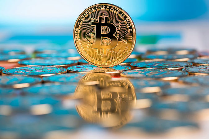 BTC Price Plummets Below $25K as Fed Pauses Interest Rate