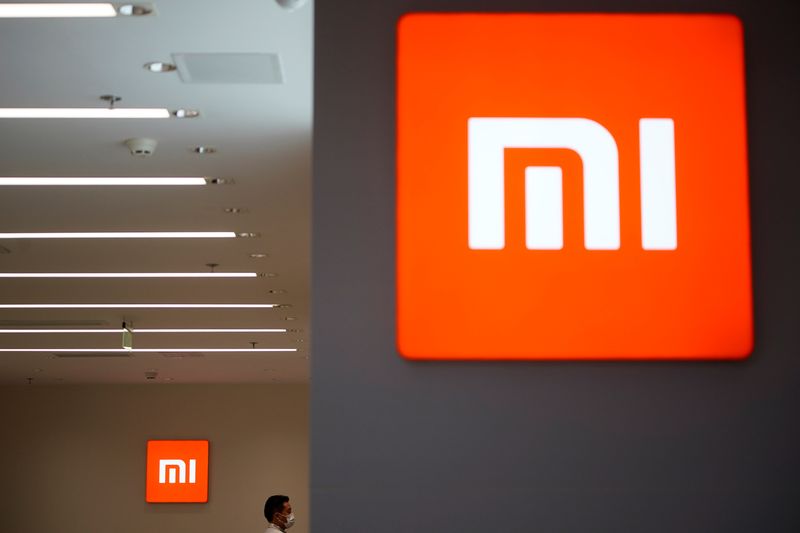 China’s Xiaomi unveils first electric car, plans to become top automaker