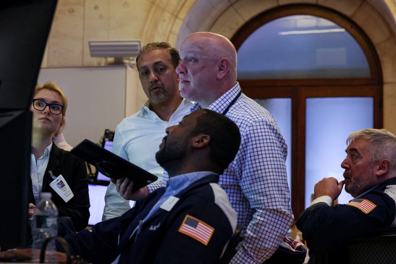 Wall Street ends slightly lower, capping blockbuster year