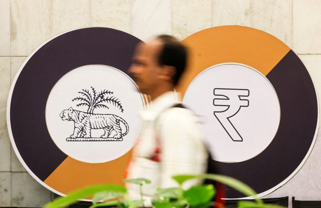 Bankers see losses from RBI capping open FX positions; Rupee seen sharply higher on Monday