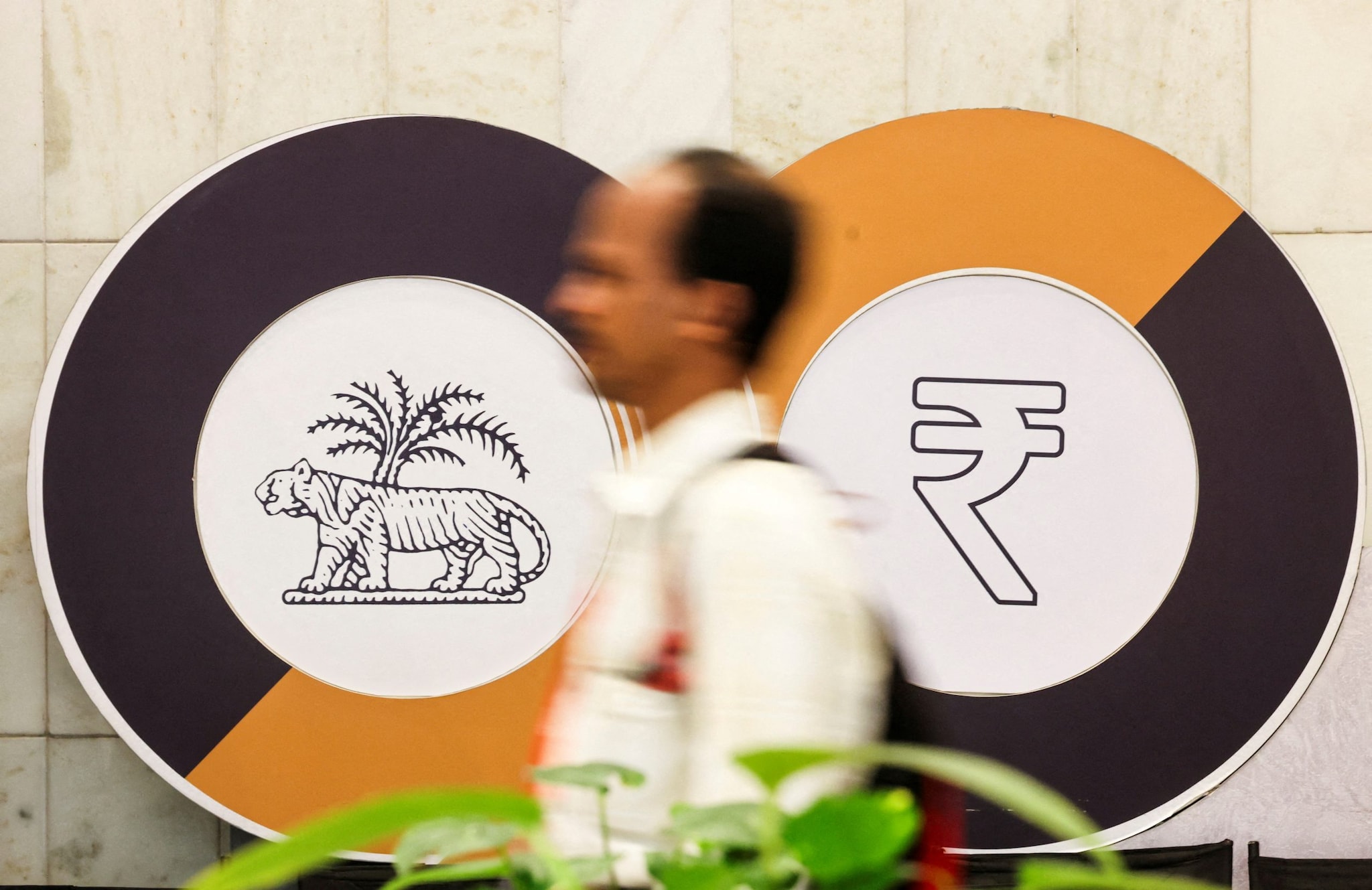 Bankers see losses from RBI capping open FX positions; Rupee seen sharply higher on Monday